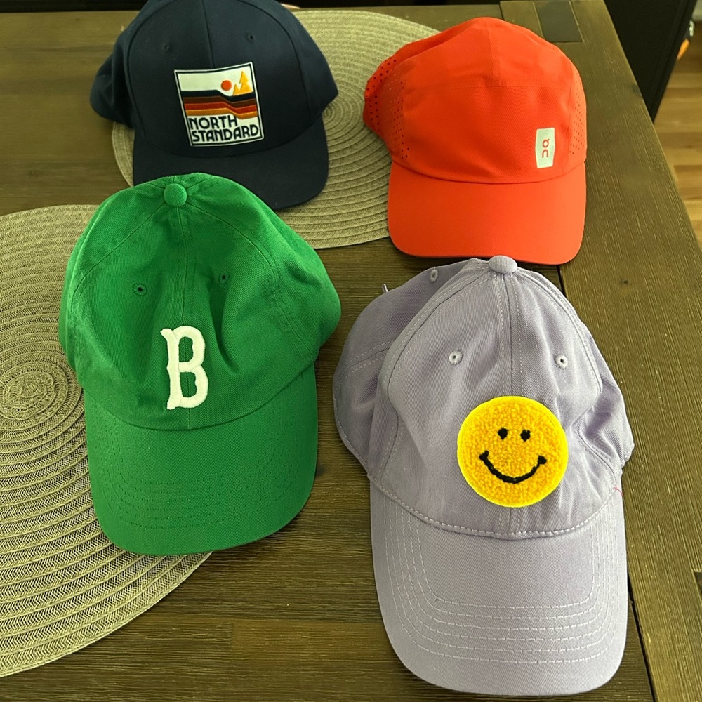 Fun baseball caps! Never worn. Got for a work team event and changed idea.